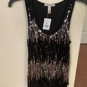 sleeveless black and silver sequined top